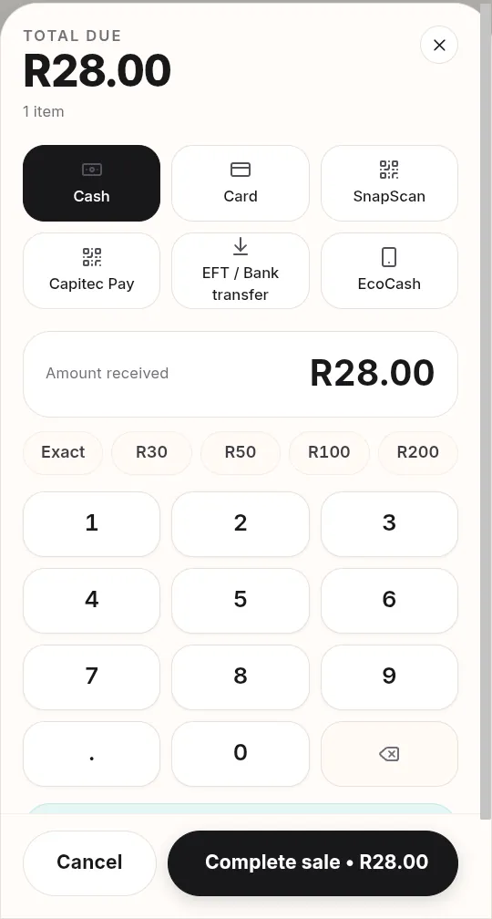Payment screen showing the total due, payment method buttons, quick cash amounts and a number keypad